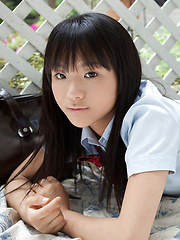 Miho Morita Asian takes school uniform off and shows body outdoor