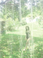 Neo Asian babe in white dress loves feeling her body in water