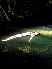 Neo Asian babe in white dress loves feeling her body in water