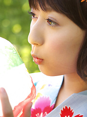 Rio Matsushita Asian shows sexy legs under geisha dress outdoor