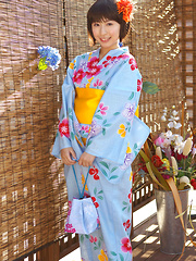 Rio Matsushita Asian shows sexy legs under geisha dress outdoor