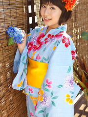 Rio Matsushita Asian shows sexy legs under geisha dress outdoor