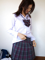 Azusa Togashi Asian undresses uniform to show behind in panty
